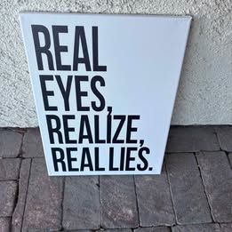 Real Eyes Realize Real Lies Canvas — 12×16 Main image