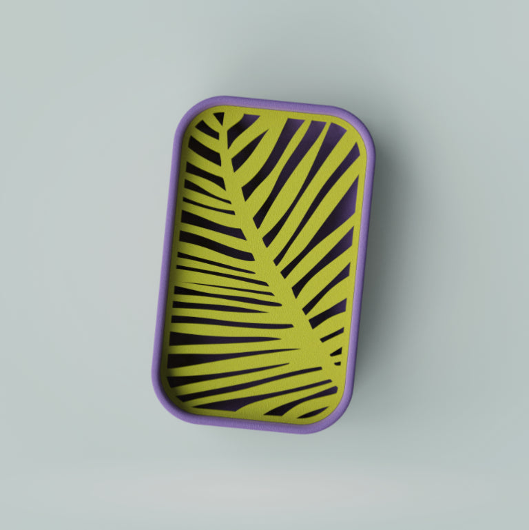 Rectangular tray with yellow and black leaf pattern on a purple border against a light gray background